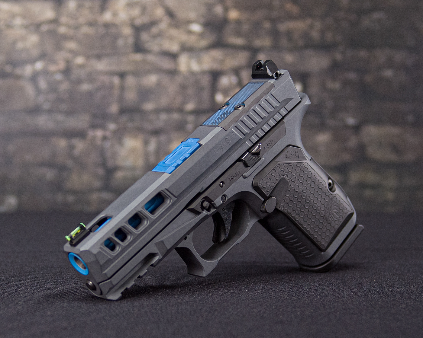 Gray and blue firearm product photograph